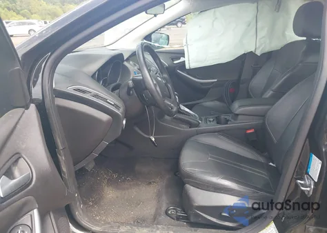 2014 Ford Focus Titanium from USA, damaged, VIN 1FADP3J22EL460562